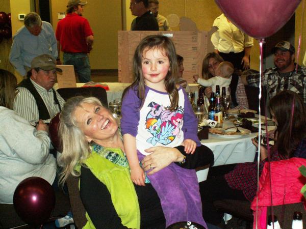 Debbie Monroe with a young admirer at the 2015 Headwaters PF Banquet